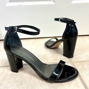 The Stuart Weitzman Women's Nearlynude Strap Sandal black block heels size 6M